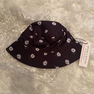 Alice + Olivia Bucket hat black with white daisys all over it